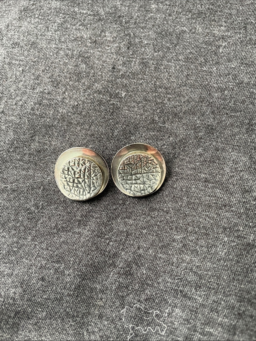 Textured Round Silver Tone Clip Button Earrings